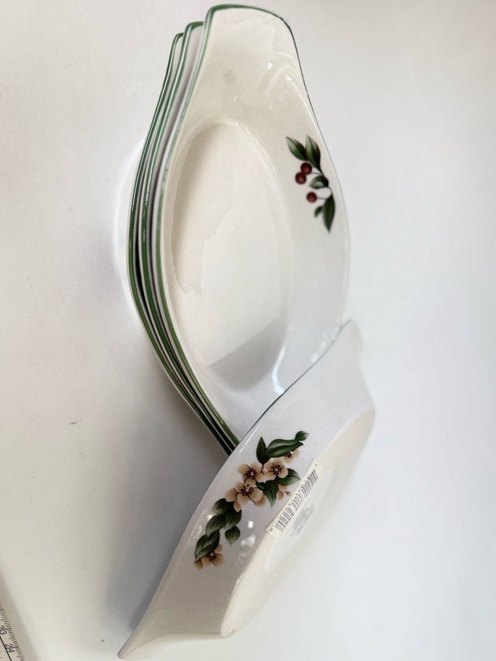 White Ceramic Serving Bowls with Green Trim and Floral Accent